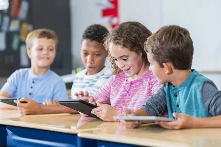 Children reading in a school classroom