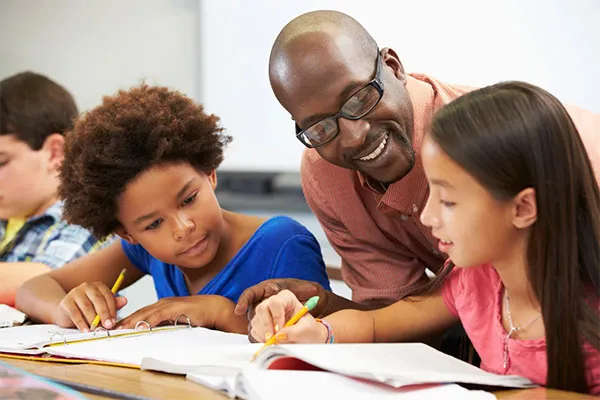 A teacher and students in a classroom