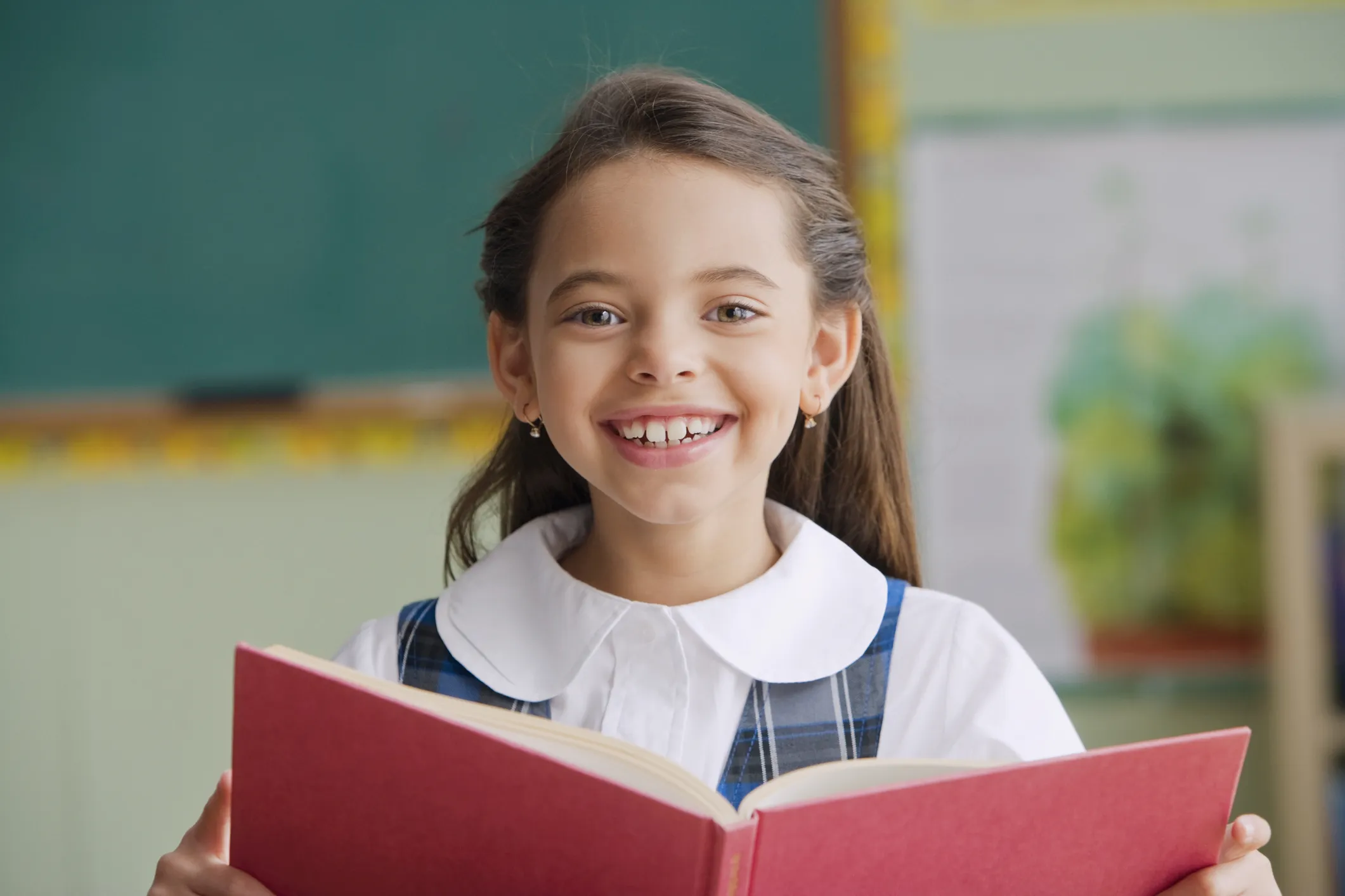 young girl with book