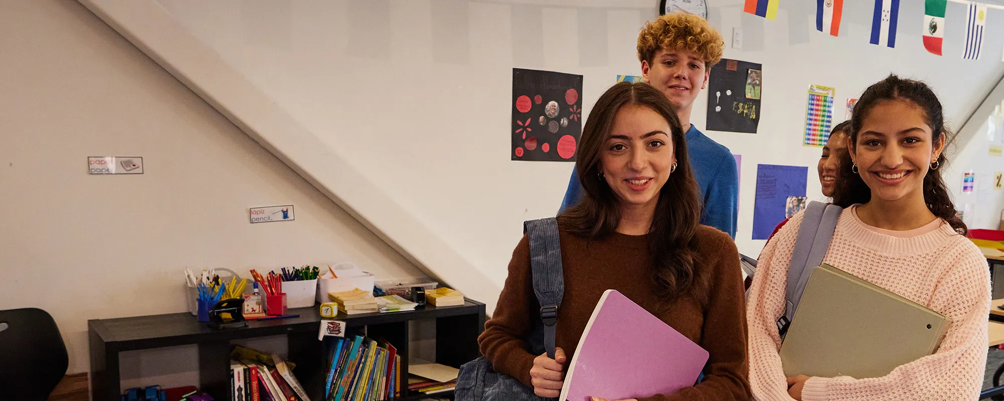 3 students in a classroom