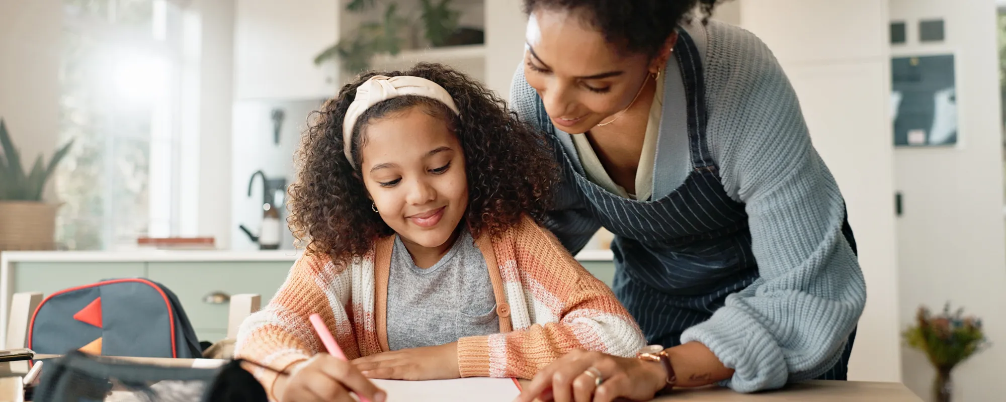 parent sharing a tablet with child