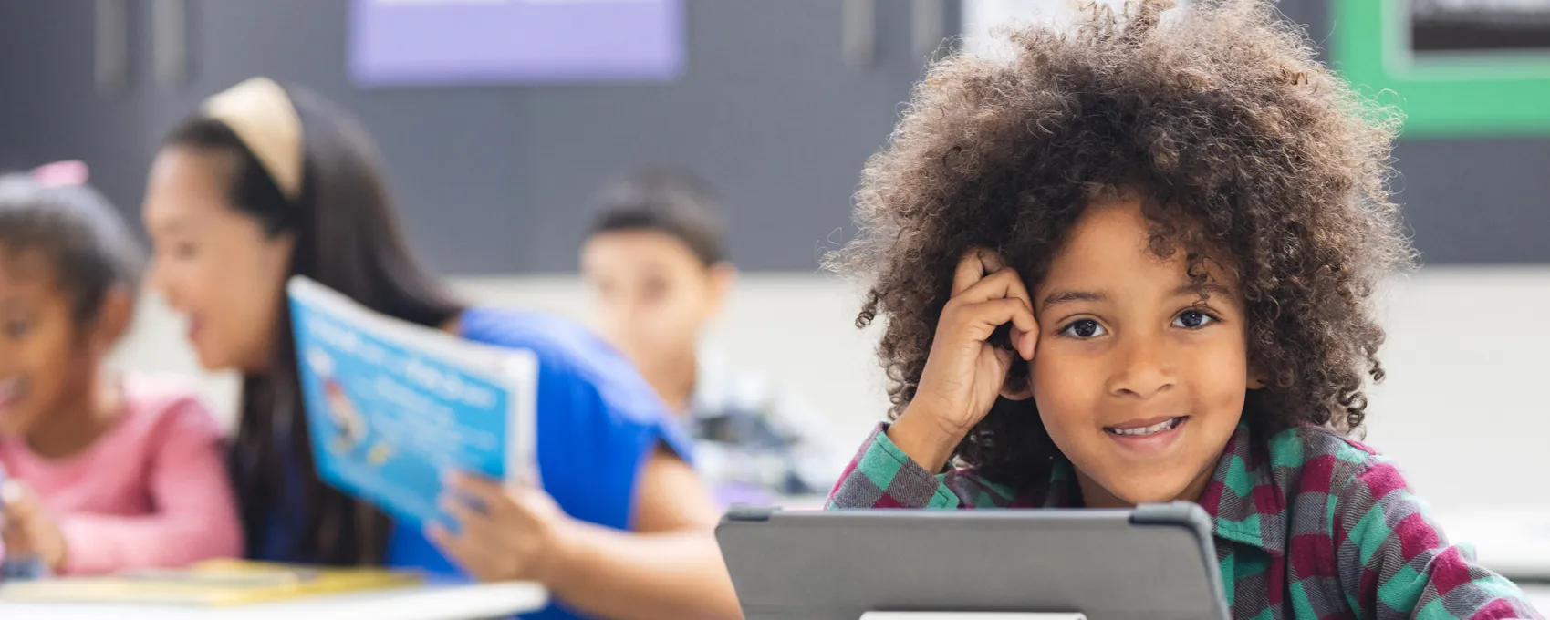 Teacher and student on computer