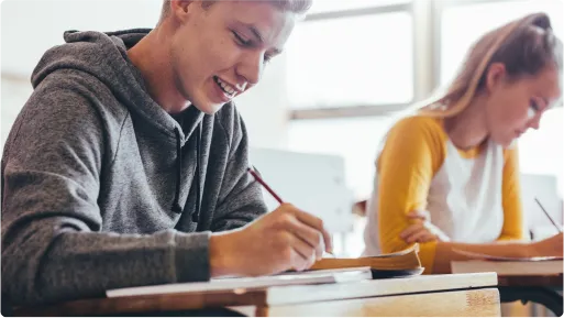 students writing at their desks